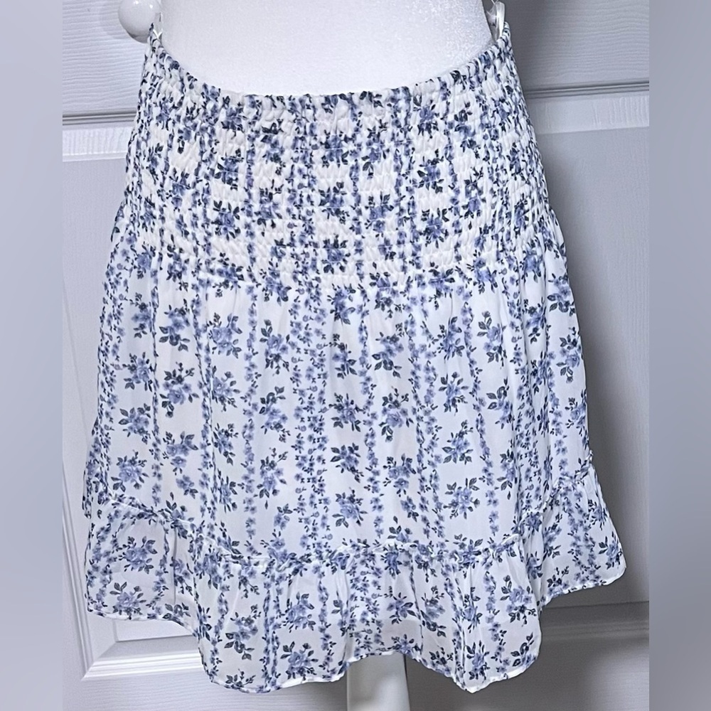 Aqua Smocked Ruffle Mini Skirt in White and Blue Floral Print